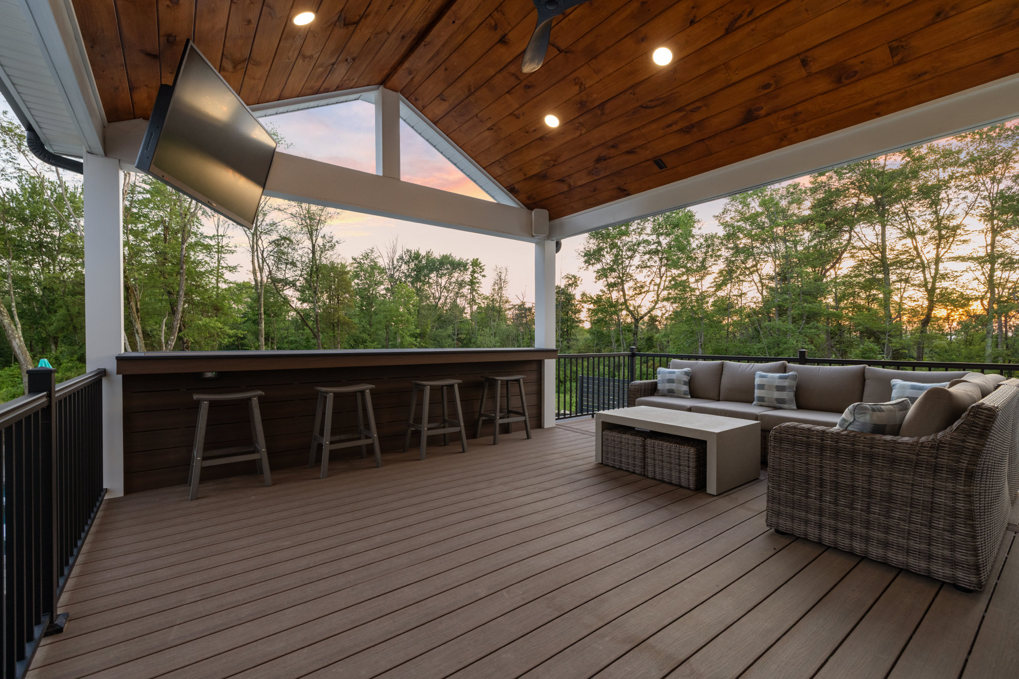 Multi-tier composite deck with built-in features by Kennedy Design+Build